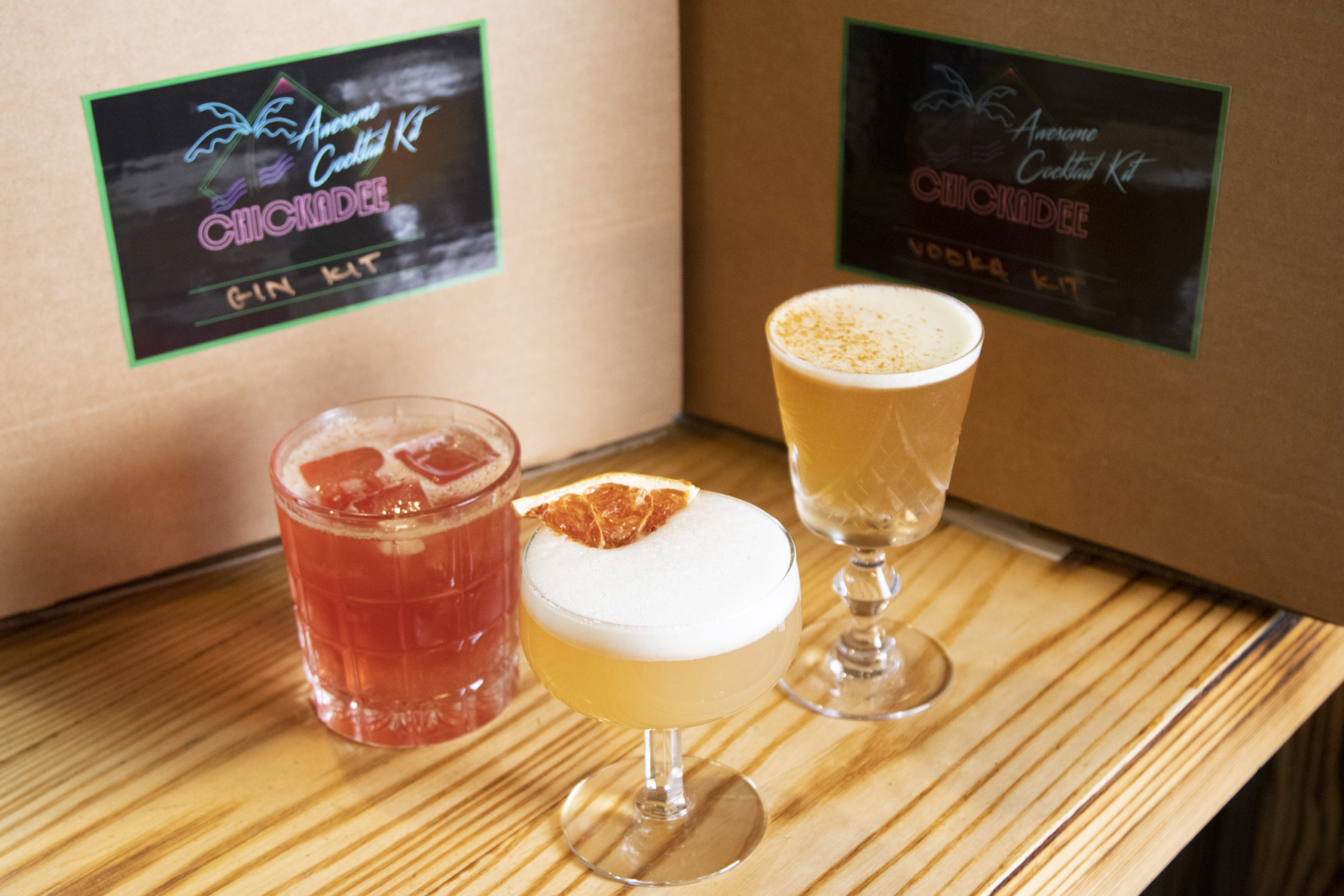 cocktail kits with three different prepared cocktails